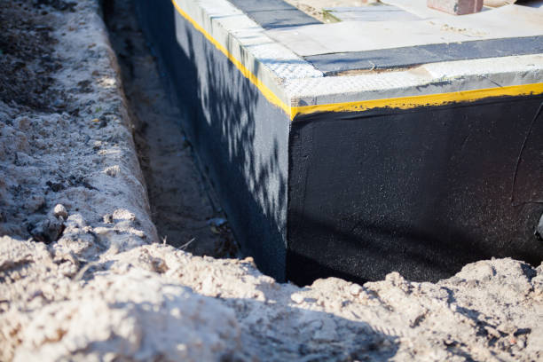 Professional Waterproofing technician working in Larwill, IN